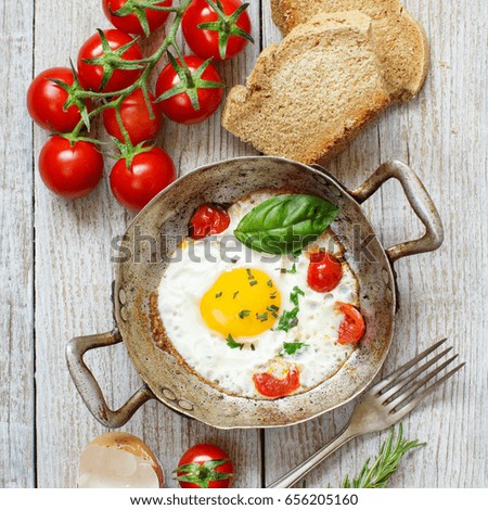 Similar – frying pan with fried omelette