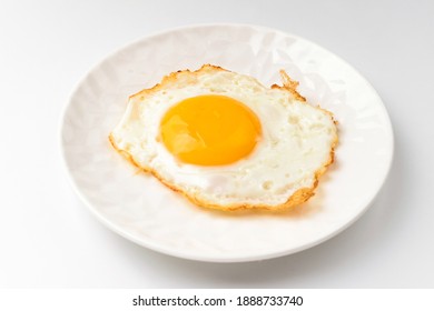 Fried Eggs On White Background