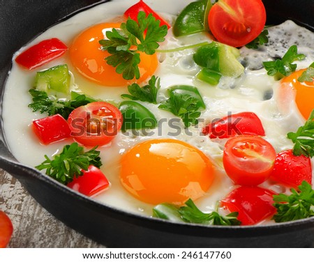 Similar – Image, Stock Photo Fried egg with a bell pepper and tomatoes