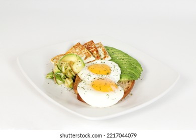 Fried Eggs With Panela Cheese And Avocado