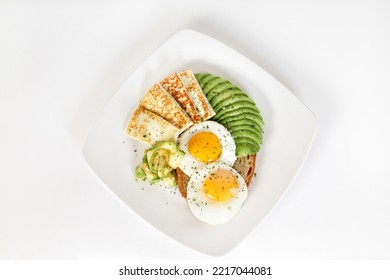 Fried Eggs With Panela Cheese And Avocado