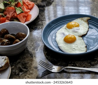 Fried eggs ready to eat - Powered by Shutterstock