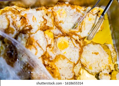 Fried Eggs In A Tray With Runny Egg Yolk