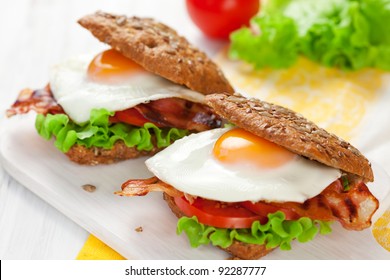 Fried Egg,tomato And Bacon In Wholemeal Sandwich