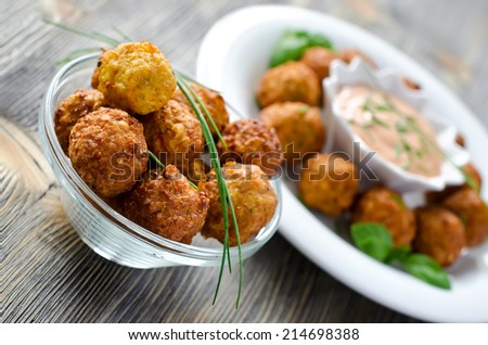 Fried falafels with a dip on wooden background selective focus Stock photo © 