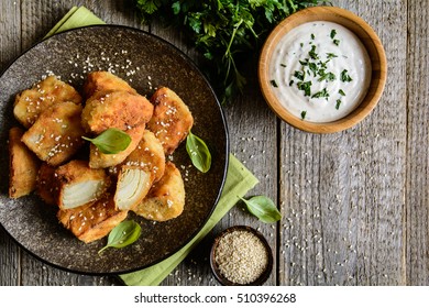 Fried Fennel Quarters Served With Sour Cream Dip