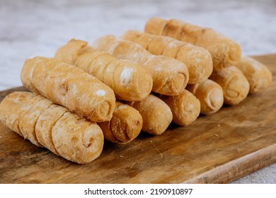 Fried tequeños, fingers stuffed with salty artisanal cheese, typical Venezuelan and Latin American food - Shutterstock ID 2190910897