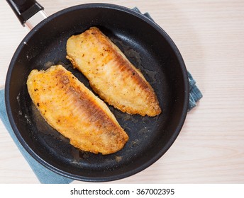 Fried Fish Fillet In A Frying Pan