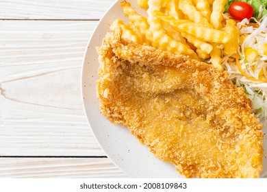 Fried Fish Fillet And Potatoes Chips With Mini Salad