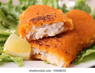 fried fish and salad
