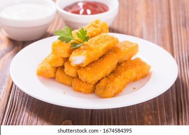 Fried Fish Sticks ( Fingers ) Or Chicken Nuggets . Snack Food