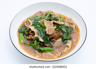 Fried flat noodle with pork and kale in gravy sauce