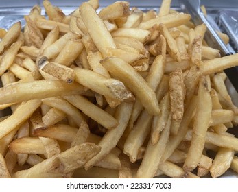 Fried French fries ready to be eaten - Shutterstock ID 2233147003