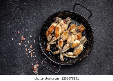fried frog legs second course meat french food healthy meal food snack on the table copy space food background rustic top view