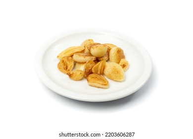 Fried Garlic Cloves Pile Closeup Isolated. Roasted Grilled Garlic Clove Group On White Background Side View