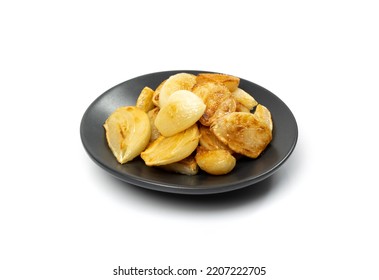 Fried Garlic Cloves Pile Closeup Isolated. Roasted Grilled Garlic Clove Group On White Background Side View