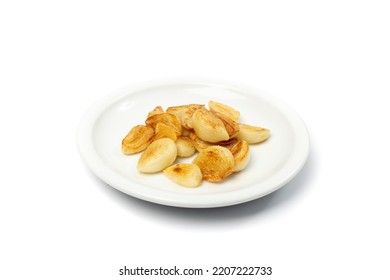 Fried Garlic Cloves Pile Closeup Isolated. Roasted Grilled Garlic Clove Group On White Background Side View