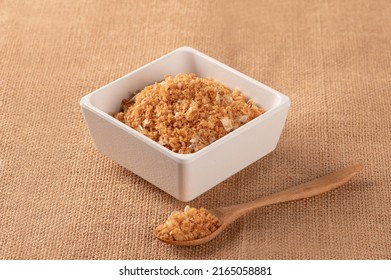 Fried Garlic In White Square Bowl And Spoon