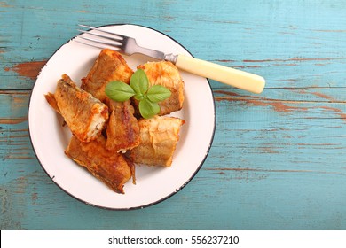 Fried Hake Fish In A White Plate