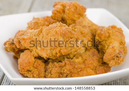 Fried Hot Chicken Wings - Chicken wings dusted in spicy flour and fried until crispy.