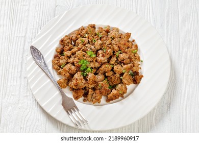 Fried Italian Sausage Of Freshly Ground Pork Meat And Spices On White Plate With Fork On White Wooden Textured Table, Horizontal View From Above