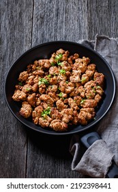 Fried Italian Sausage Of Freshly Ground Pork Meat And Spices In Skillet On Dark Wooden Table, Vertical View  From Above