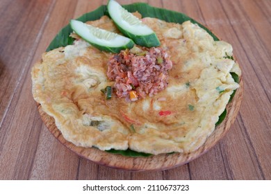 Fried Omelet With Rebon Prawns And Cucumber Slices