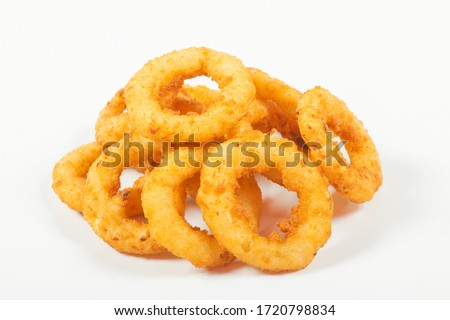 fried onion rings in batter, on an isolated white background