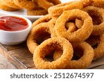  Fried onion rings with mozzarella or plain. Delicious onion rings on table