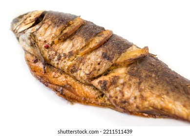 Fried Or Oven Baked Whole Fish Isolated On White Background.