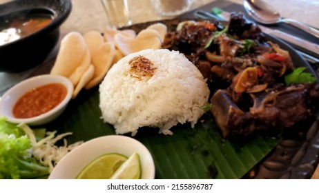 Fried Oxtail With Traditional Secret Ingridient With Ketchup And Spicy Sauce  