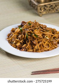Fried Penang Char Kuey Teow which is a popular noodle dish in Malaysia, Indonesia, Brunei and Singapore 