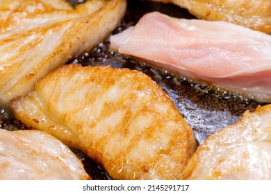 Fried Pieces Of Meat Close-up, Pork From Fatty Meat At Home. Food Cooked In A Pan. Selective Focus