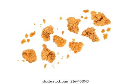 Fried popcorn chicken falling in the air isolated on white background. - Shutterstock ID 2164488043