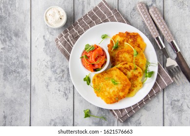 Fried Potato Pancakes With Salmon And Sour Cream, Fritter, Roesti, Golden Crispy Crust. Traditional Delicious Food, Breakfast