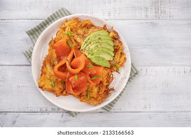 Fried Potato Pancakes With Salmon And Sour Cream, Fritter, Roesti, Golden Crispy Crust. Traditional Delicious Food, Breakfast