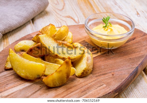 Fried Potato Wedges Cheese Sauce Stock Photo Edit Now