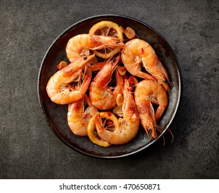 Fried Prawns On Black Plate, Top View