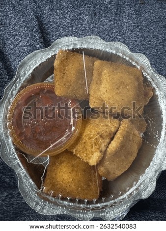 Fried ravioli with marinara sauce