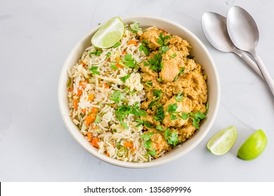 Fried Rice And Chicken Korma - Top DOwn Photo - Indian Food, Indian Lunch Bowl. High Angle Photo Of Fried Rice And Chicken Curry. Indian Lunch Concept.