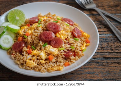 Fried rice with chinese sausage on plate