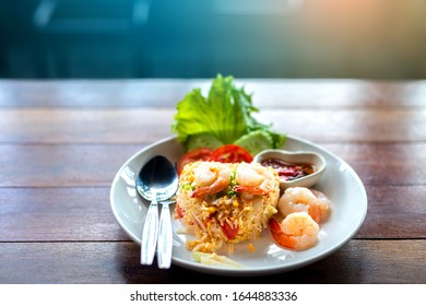 Fried Rice With Spicy Shrimp On Wooden Table , Home Made Food Thai Style.