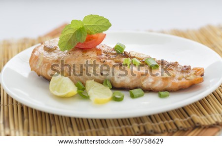 A fried salmon fish.