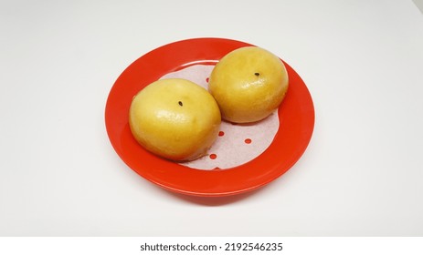 Fried Salted Egg Bun On Red Plate.