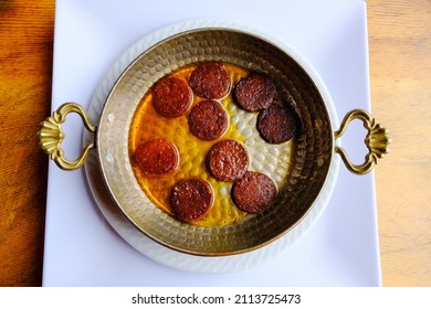 Fried Sausage In Copper Pan.
Top View Of Turkish Fried Sausage