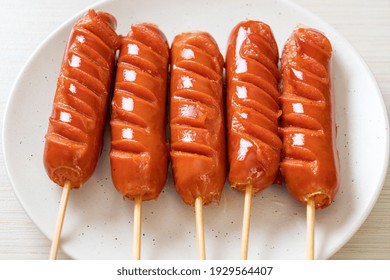 Fried Sausage Skewer On White Plate