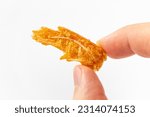 Fried shrimp head snack on white background