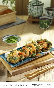 Fried Shrimp And Spinach Tempura Put On The Blue Square Plate In The Wooden Table