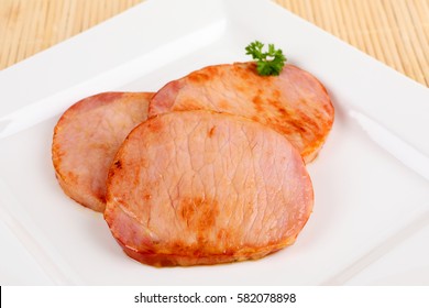 Fried Smoked Pork Chop On A Plate