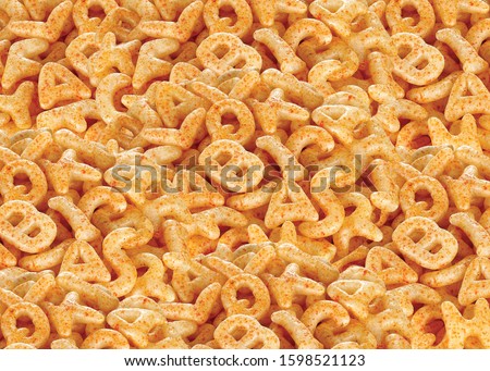 Fried and Spicy ABCD, Alphabet Snacks or Fryums (Snacks Pellets) food background, selective focus - Image